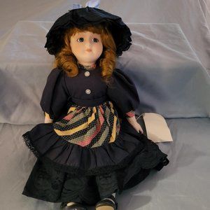 #403 Vintage Heritage Signature Collection Porcelain Doll, with Blue Dress